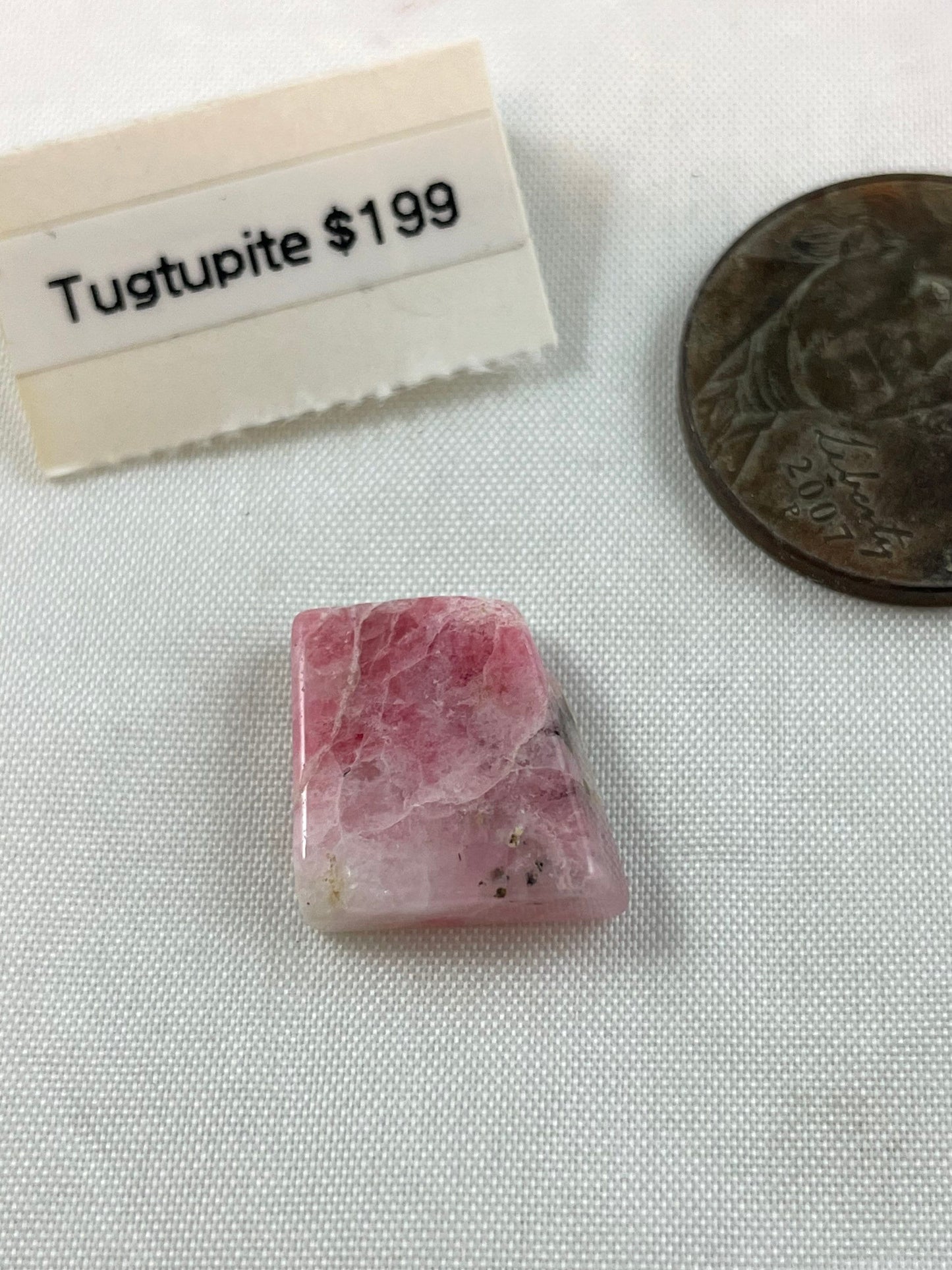 Rare Tugtupite